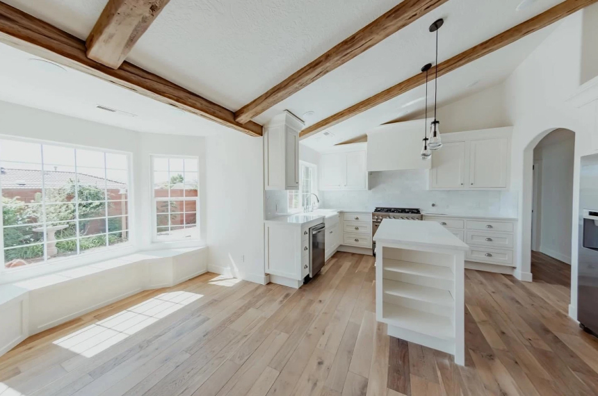 Open great room with exposed beams